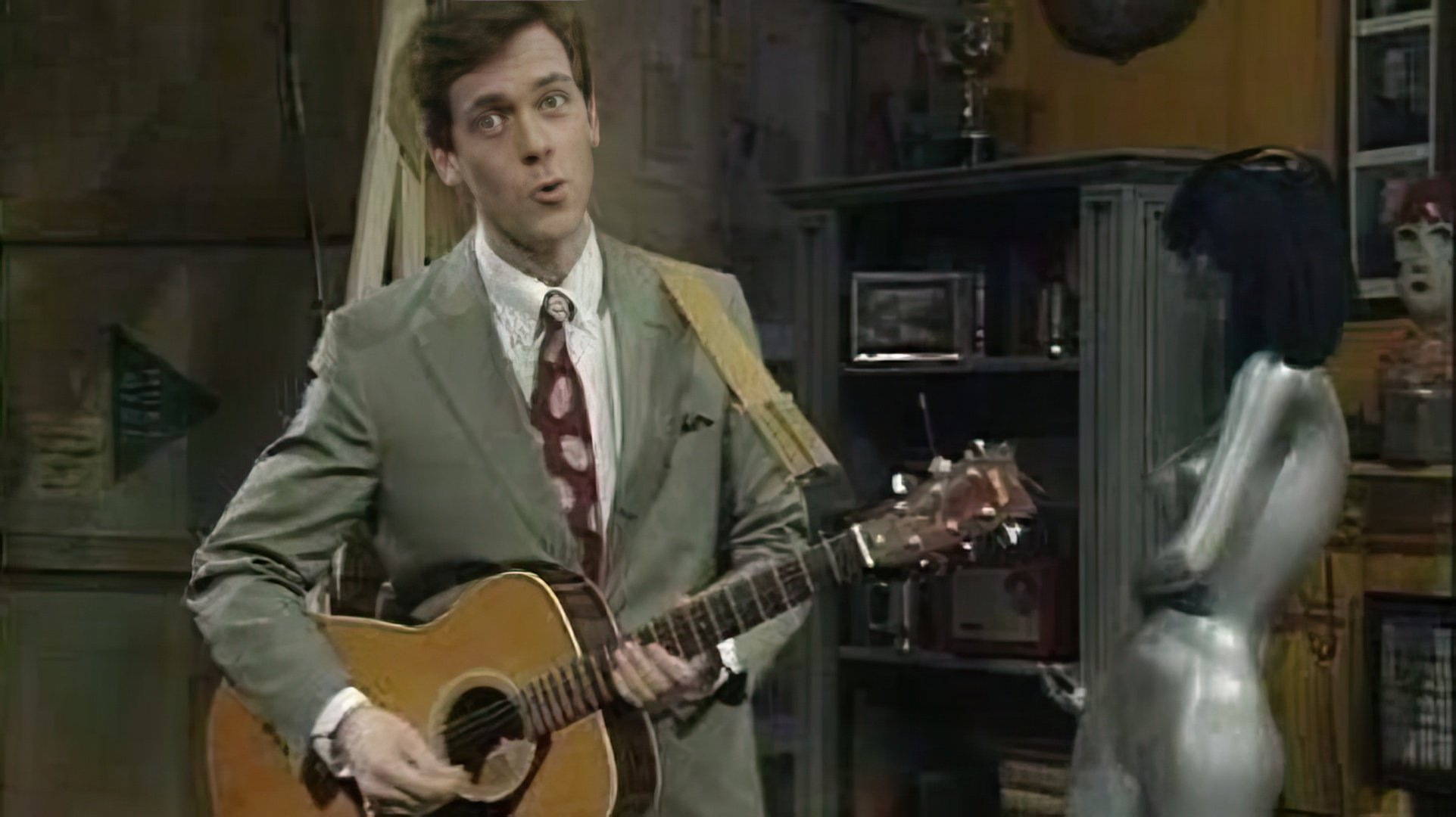 Hugh Laurie suona eccellentemente la chitarra, il pianoforte e l'armonica