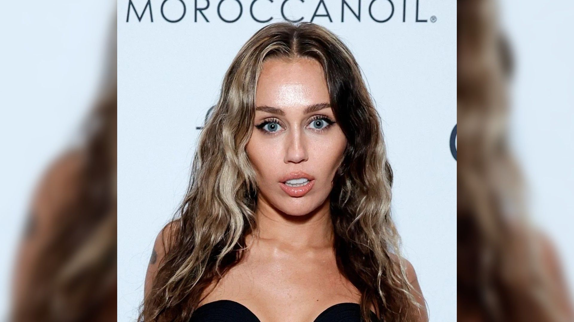 Miley Cyrus, primo piano del viso, capelli lunghi