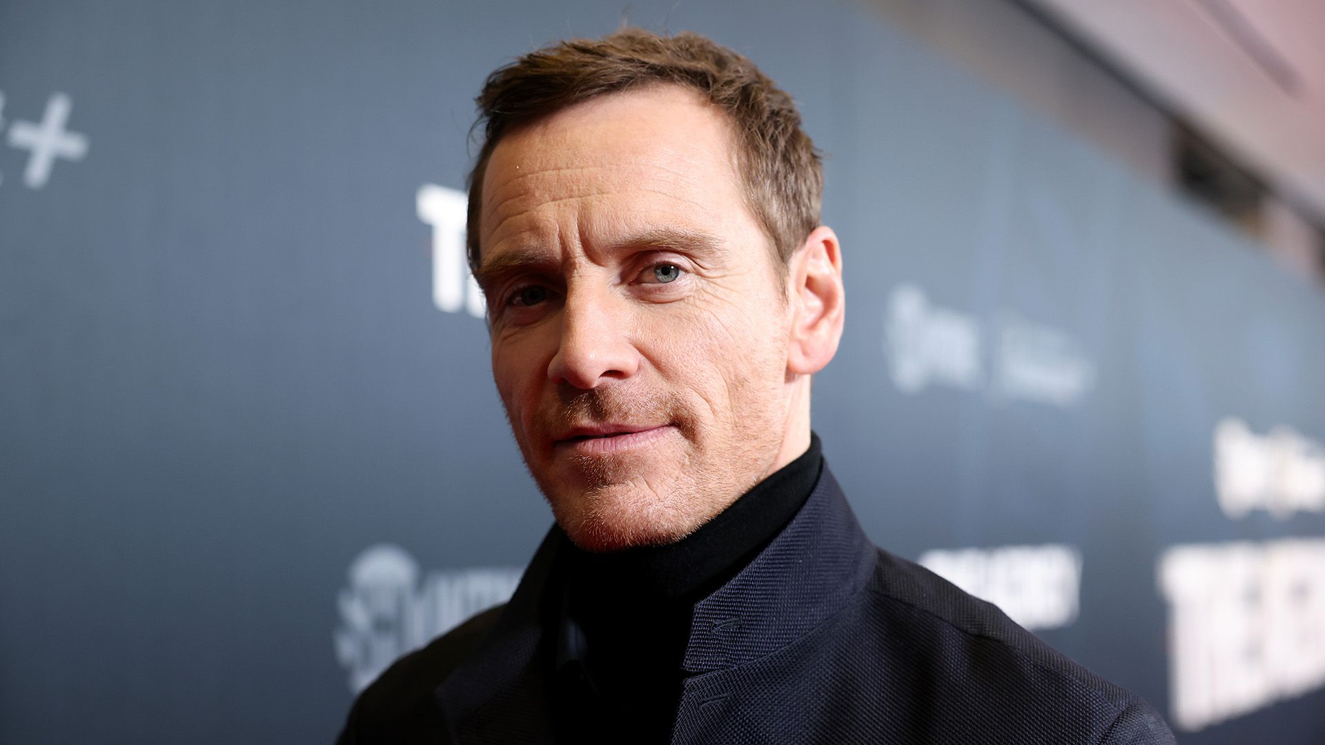 Actor Michael Fassbender with a calm smile