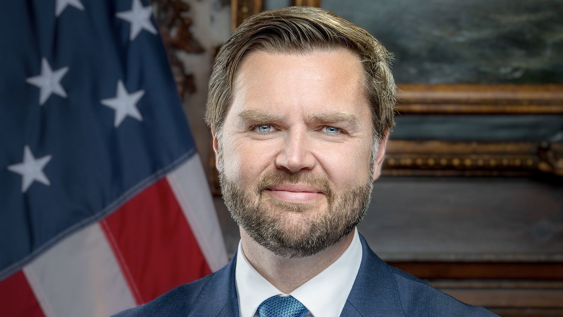 J.D. Vance primo piano sullo sfondo della bandiera degli Stati Uniti