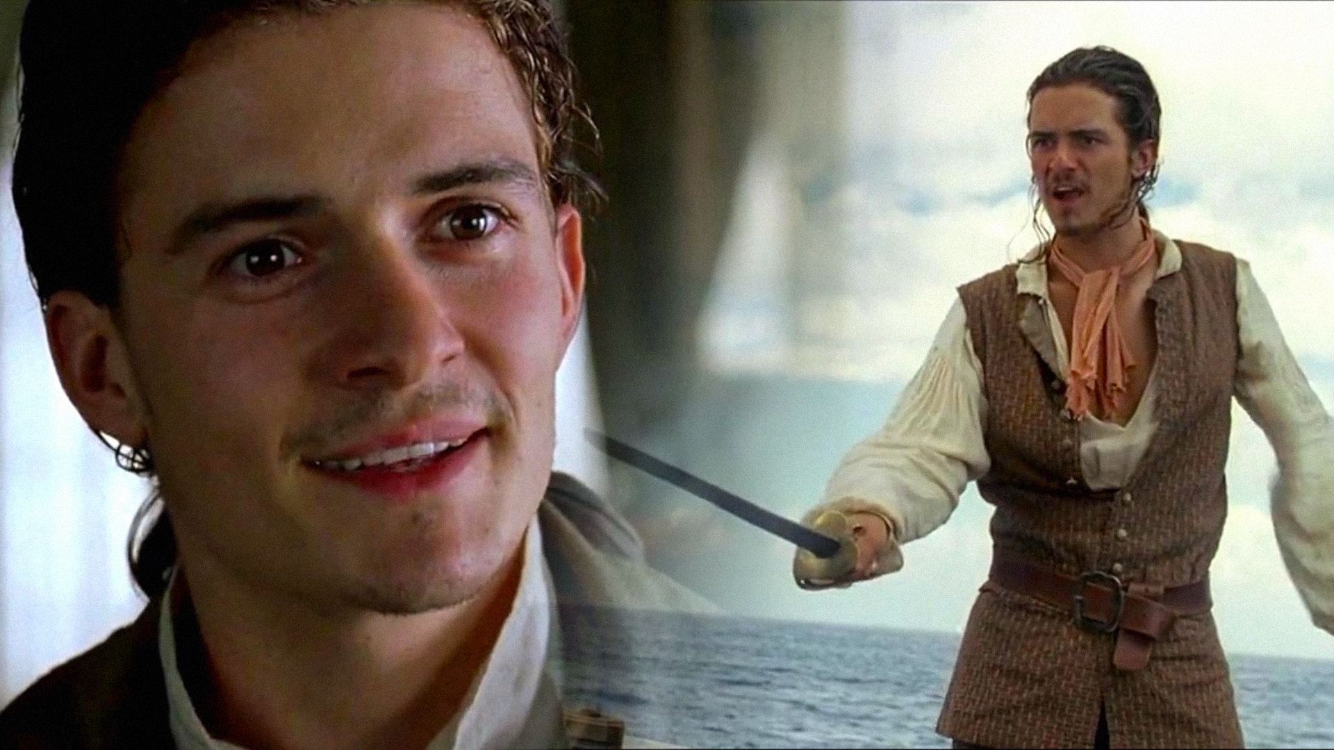 L'attore Orlando Bloom nei panni di un pirata con la spada in mano