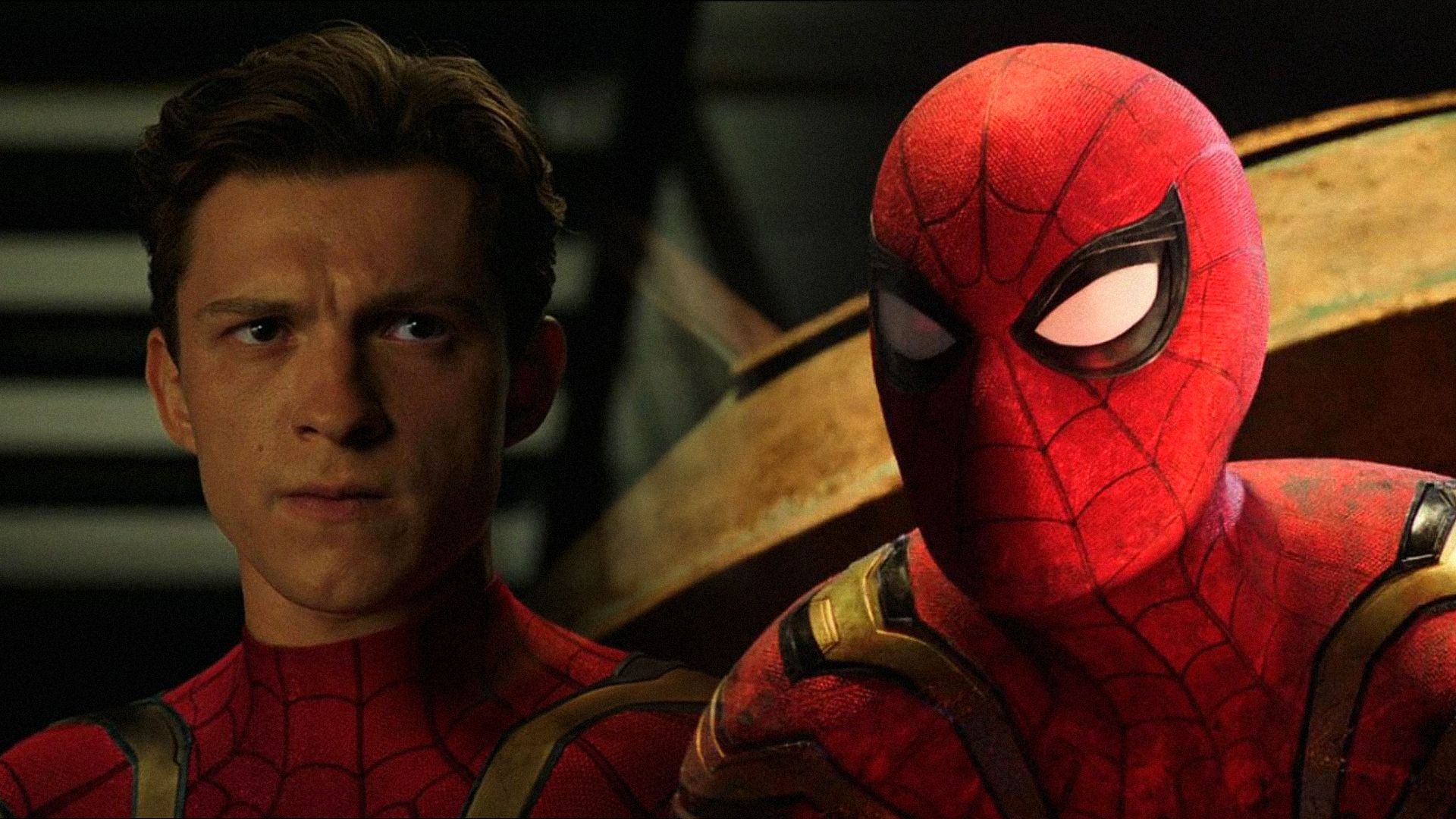 L'attore Tom Holland in costume da Spider-Man guarda minacciosamente di lato contro uno sfondo scuro
