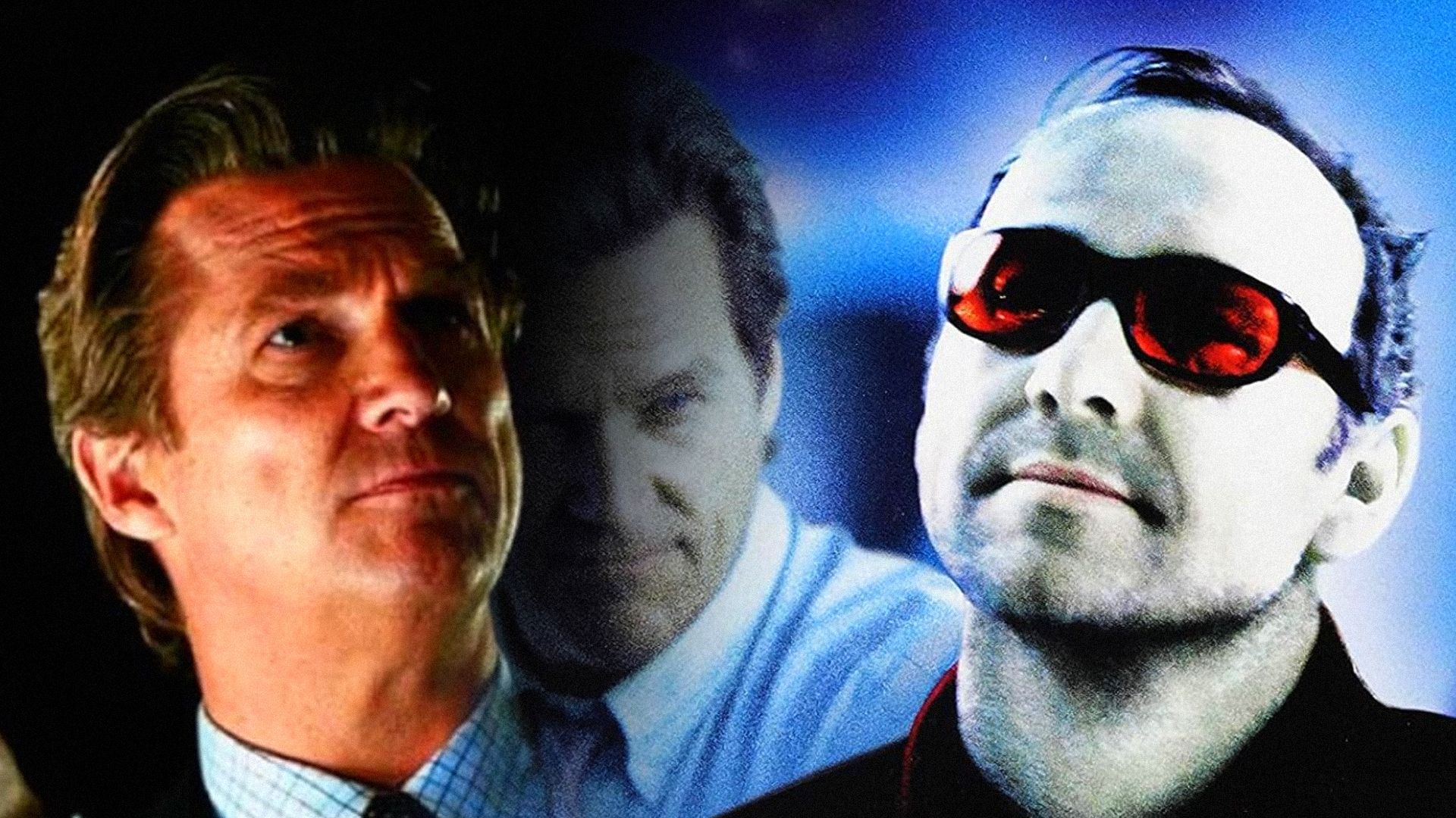 L'attore Jeff Bridges in camicia e giacca e l'attore Kevin Spacey in giacca scura e occhiali rossi